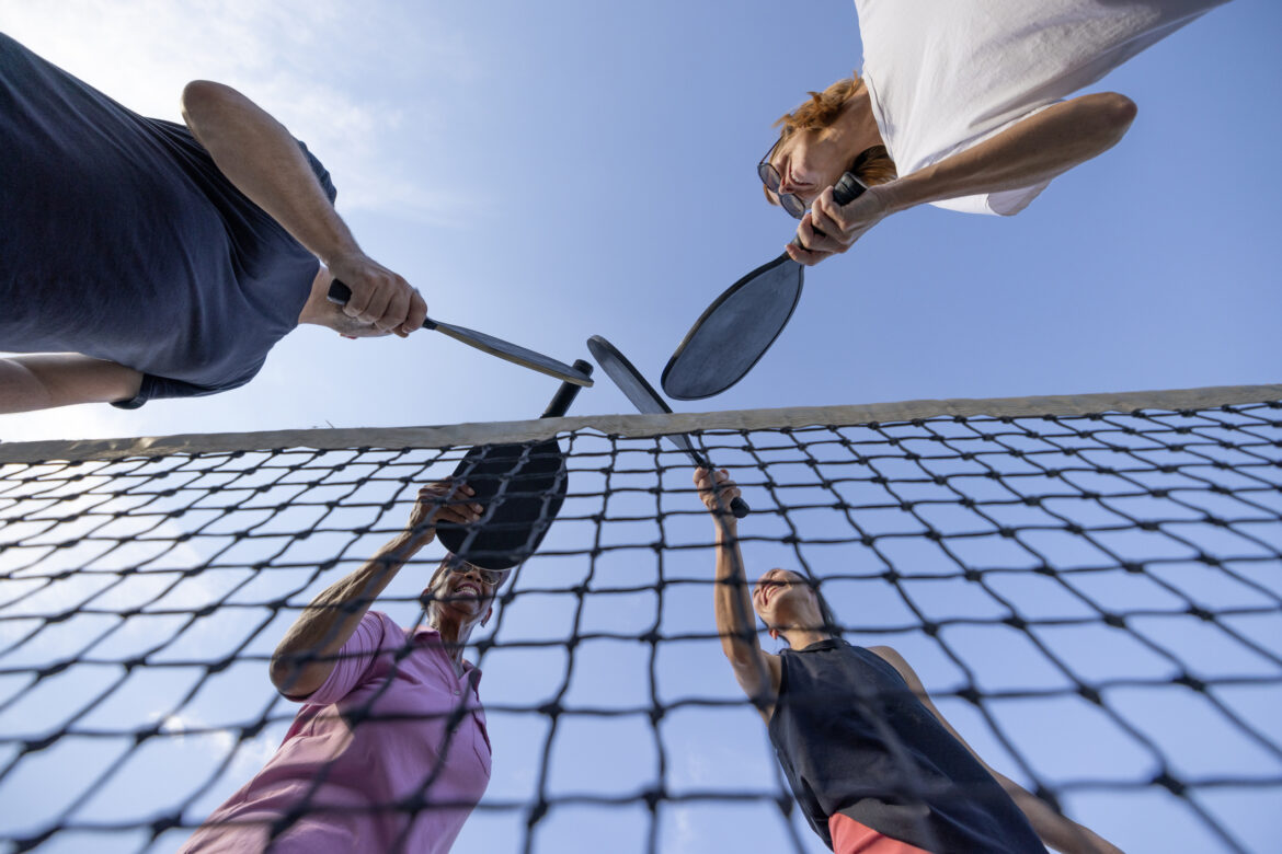 Pickleball paddles in a travel setting with airlines