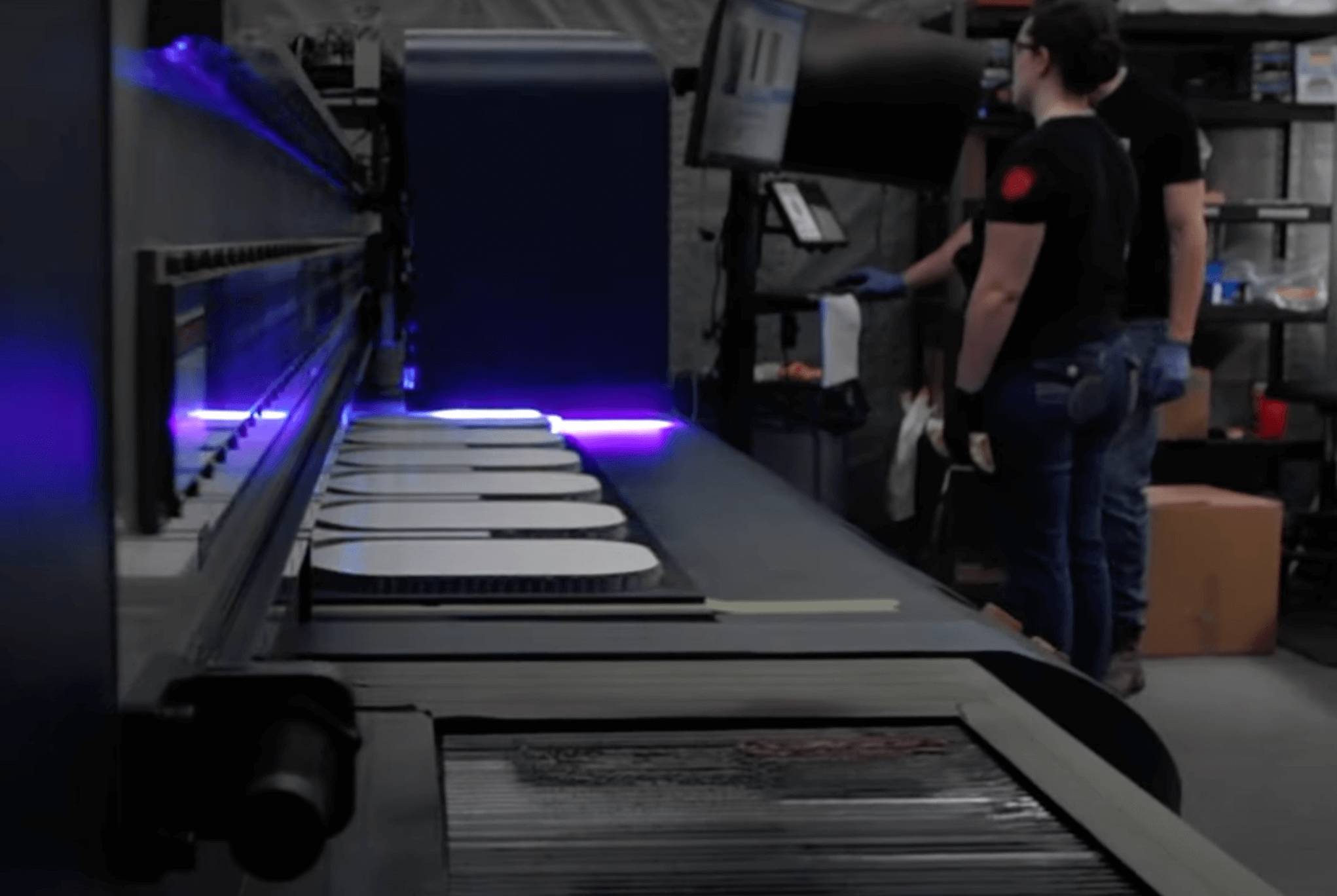 An interior shot of a clean, modern factory floor with paddle components.