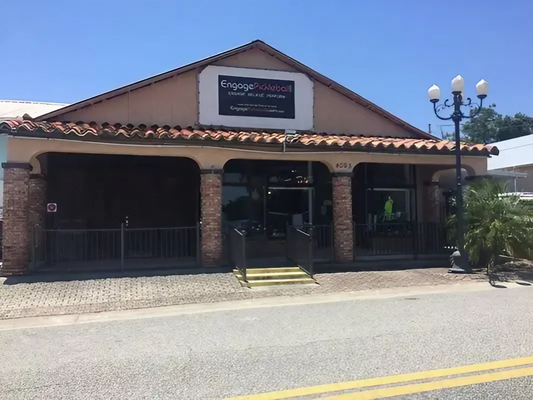 The exterior of the Engage Pickleball facility in Oxford, Florida, with its Pro Shop sign visible.